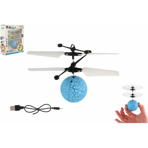 Helikopter labda repül